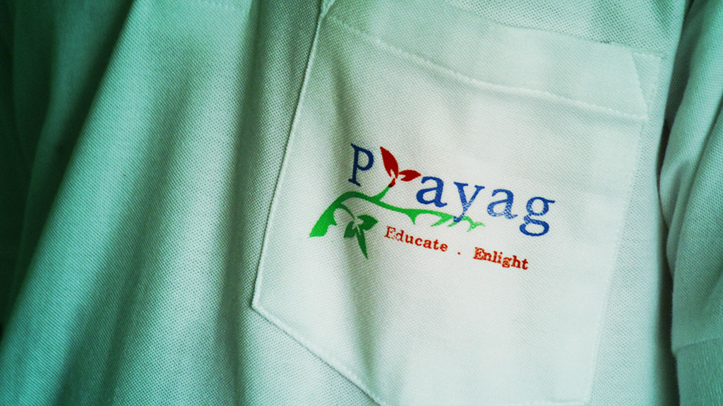 Close-up of a Prayag shirt with the logo embroidered on the pocket